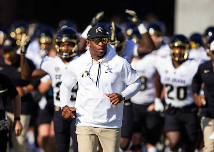 Colorado Buffaloes head coach Deion Sanders against the Arizona State Sun Devils at Mountain America Stadium
